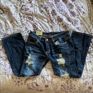 Distressed Machine Jeans